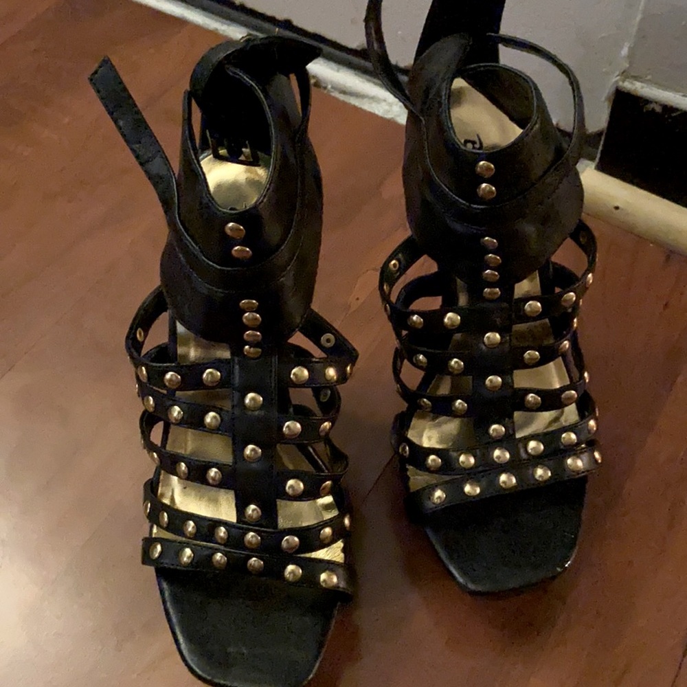 Black platform heels with gold